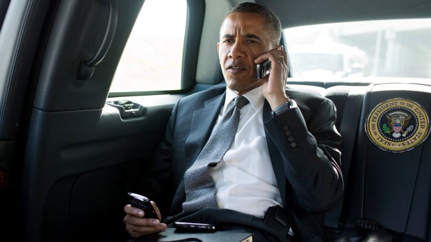 US President Barack Obama uses a Blackberry.