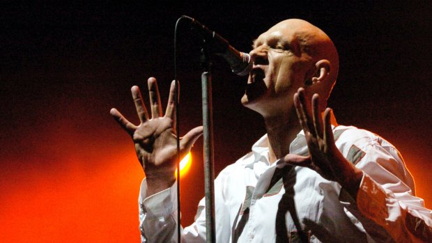 Peter Garrett performing with Midnight Oil for Wave Aid the Tsunami Relief concert at the Sydney Cricket Ground in 2005.
