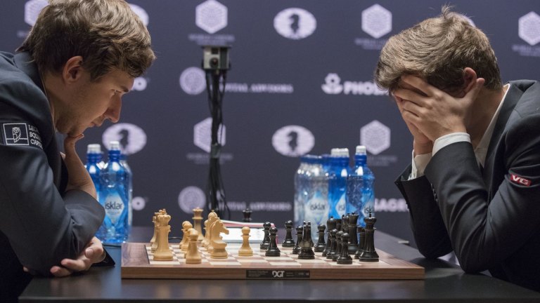 Magnus Carlsen retains world chess title by beating Fabiano Caruana in tie- breakers