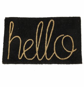 The Woodsfollk black and natural Hello doormat.