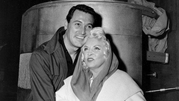 Actor Rock Hudson and actress Mae West rehearse 'Baby It's Cold Outside' for the 1958 Academy Awards In LA.