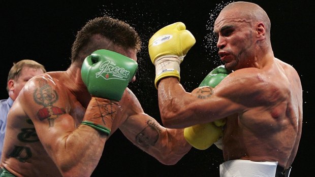 Last time they met: Anthony Mundine teaches Danny Green a few lessons in 2006.