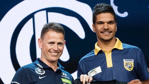 Carlton coach Brendon Bolton with Sam Petrevski-Seton.