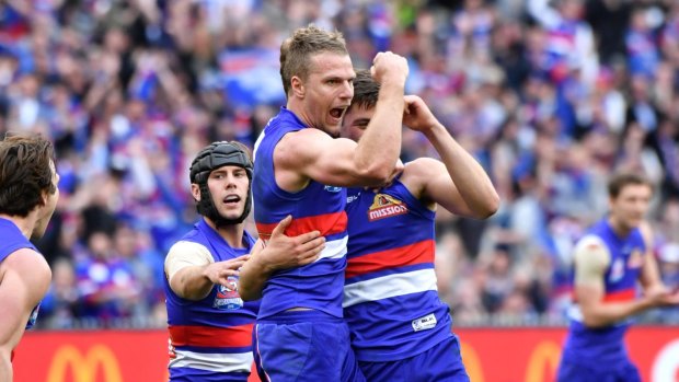 The Bulldogs celebrate a late Jake Stringer goal.