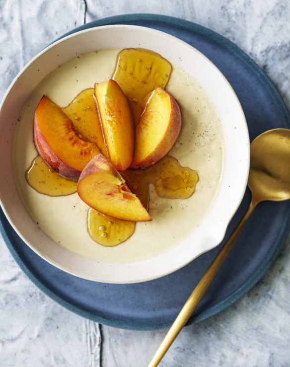 Milk and honey panna cotta with fresh peaches.