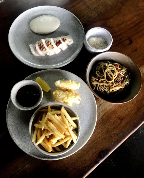 Kids' dishes at Ryne (clockwise from top): Grilled chicken breast with mashed potato, spaghetti bolognese and rockling tempura with french fries and lemon.