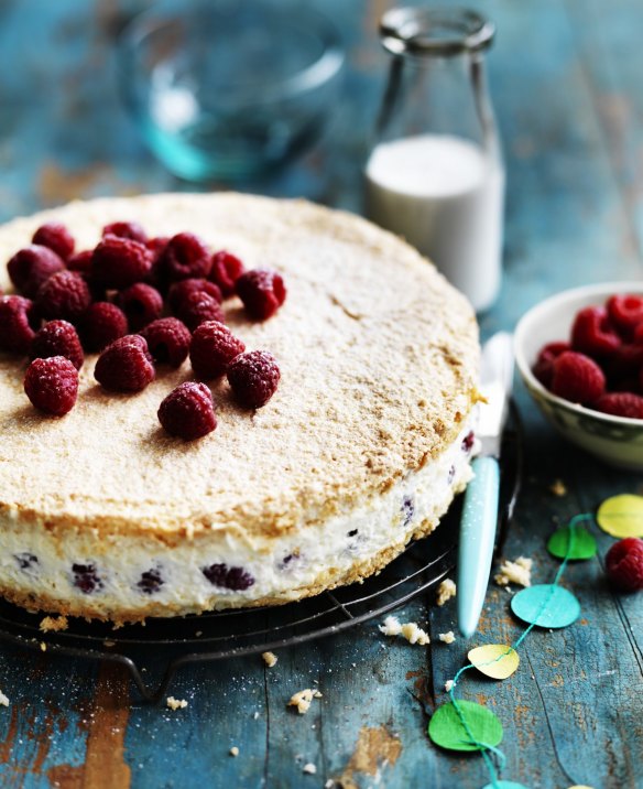 Raspberry and mascarpone cake sandwiched with coconut meringues.