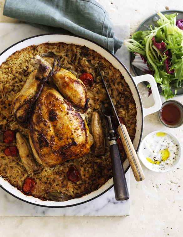 Serve this roast chicken and rice with salad greens, yoghurt and your favourite spicy sauce.