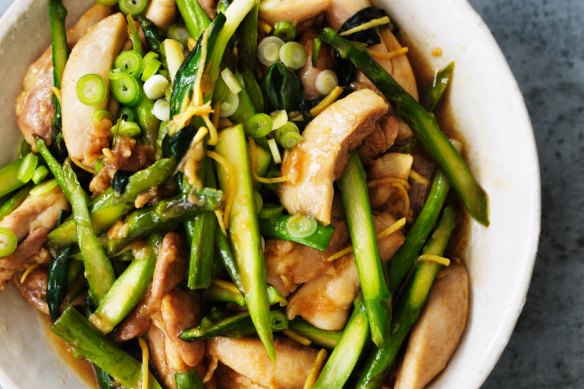 Kylie Kwong's stir-fried chicken fillets with fresh asparagus spears.