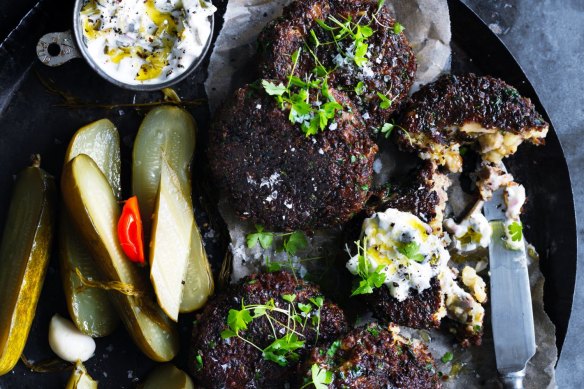 Pumpernickel pork patties with gherkin mayo and pickles.