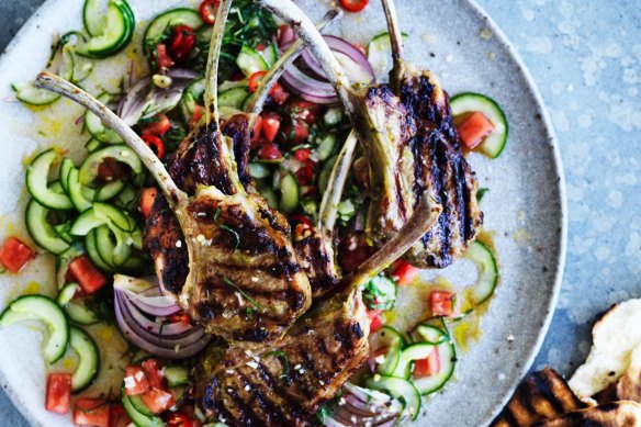 Barbecued lamb cutlets with spicy mint and cucumber salsa.