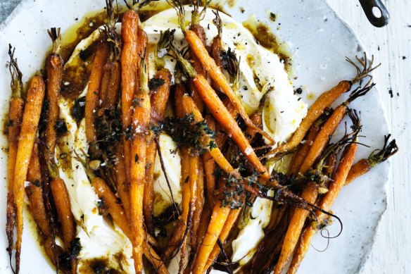 Brown butter and citrus roasted carrots on a bed of labna.