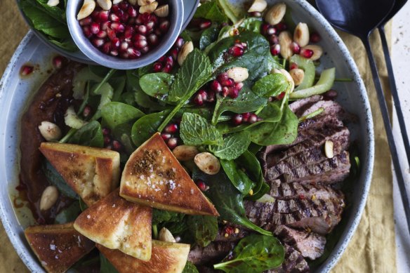 Grilled lamb salad with date paste, pomegranate and crunchy pita croutons.