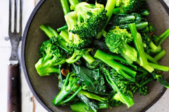 Three broccolis in garlic oil.