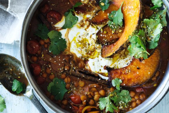 Spiced chickpea stew topped with roast pumpkin wedges.