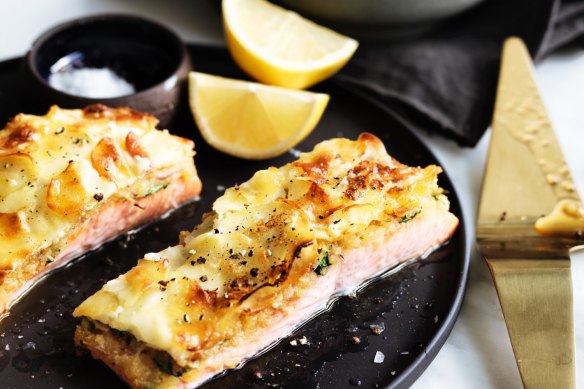 Herb-crusted ocean trout with potato gratin.