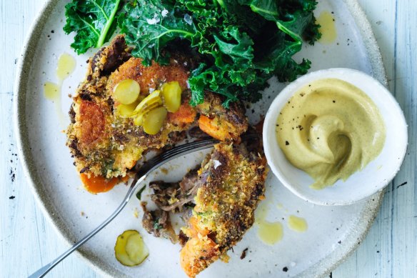 Winter fritters: Oxtail cakes with pickles, kale and mustard.