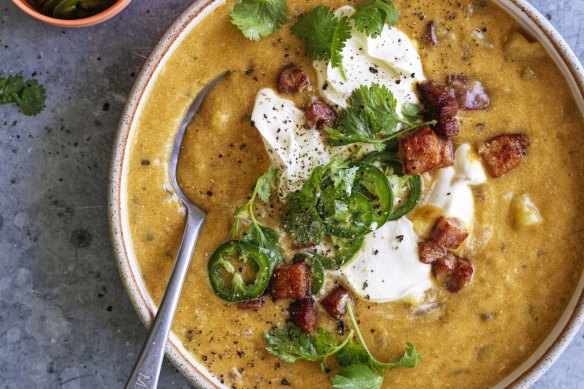 Serve the soup with sour cream, jalapenos and coriander.