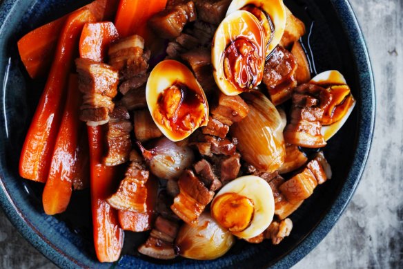 Pork belly, carrots and red shallots braised in red master stock (eggs optional).