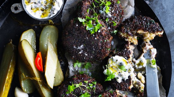 Pumpernickel pork patties with gherkin mayo and pickles.