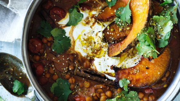 Spiced chickpea stew topped with roast pumpkin wedges.