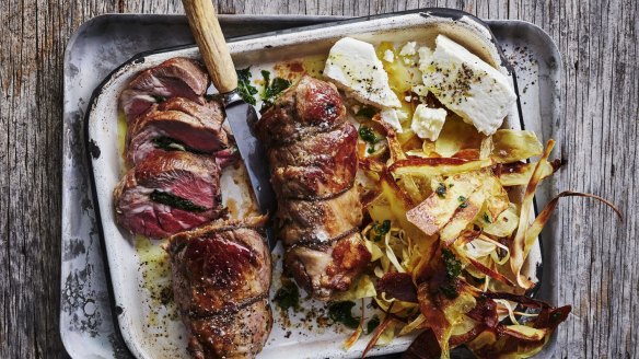 Herb and anchovy stuffed lamb with feta and vegetable crisps.