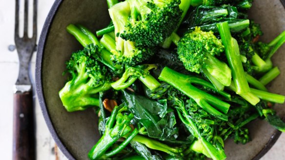 Three broccolis in garlic oil.