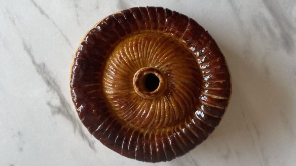 The pithivier from Lode has meticulously folded layers that pull away to reveal a rich pork filling.