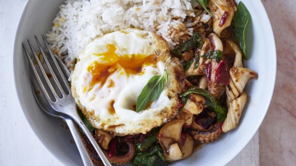 Thai-style stir-fry pad kra pao topped with a crispy fried egg.