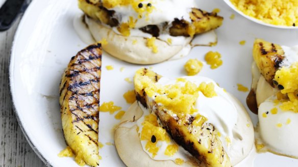 Tropical pavlova: Palm sugar meringues topped with barbecued pineapple, and mango-passionfruit granita <a href="http://www.goodfood.com.au/recipes/palmsugar-meringue-and-grilled-pineapple-with-mango-passionfruit-granita-20151213-

47rn3"><b>(Recipe here).</b></a>