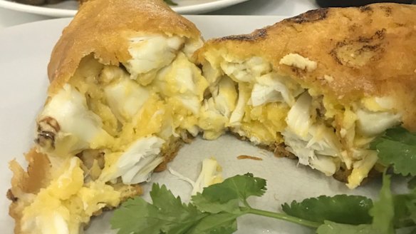 <i>Jay Fai's signature dishes - crab omelette and drunken noodles with prawns.</i>