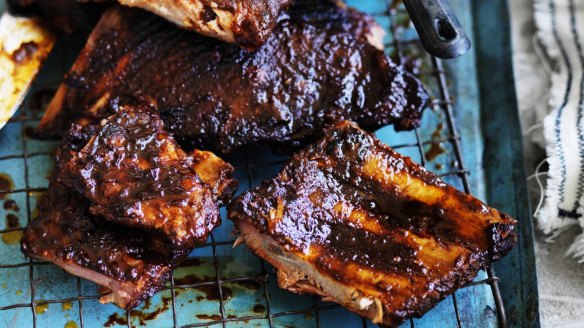 Baby back ribs with barbecue sauce.