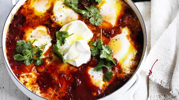 One-pot wonder: Baked eggs with chorizo sausage and cooling labna.