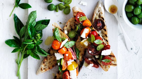 Neil Perry's bruschetta with cherry tomatoes, basil, olives and feta.