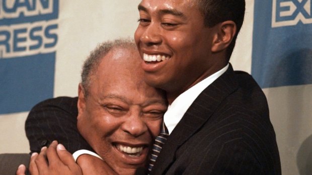 Sage advice: Tiger Woods hugs his father, Earl in 1997.
