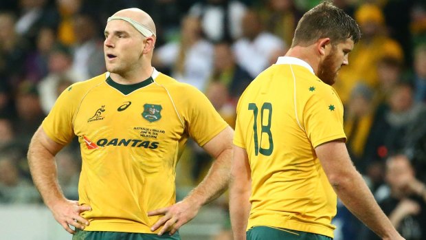 Bad night at the office: Stephen Moore and Greg Holmes look on in Melbourne.