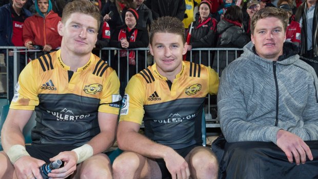 Three's company: Jordie and Beauden Barrett of the Hurricanes and Scott Barrett from the Crusaders.