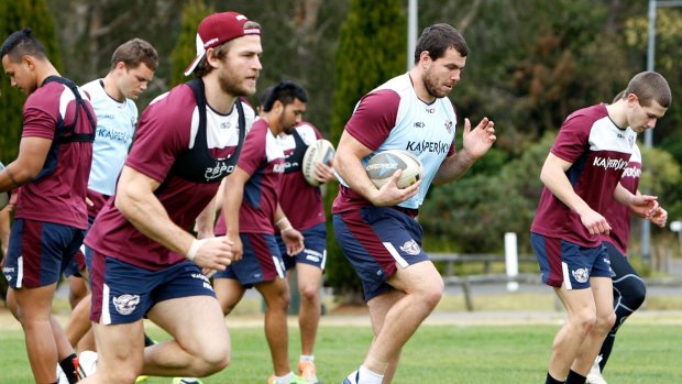 On the way back: David Williams (left) trains with his Manly teammates.