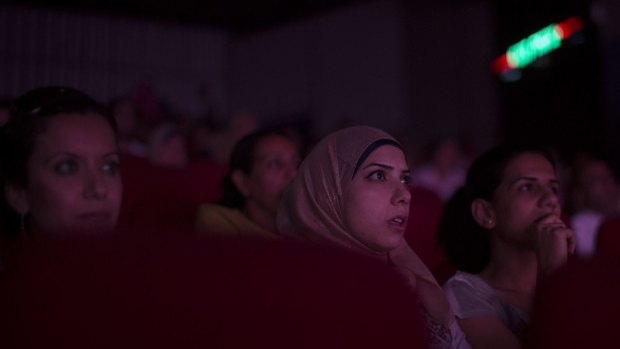 An audience watches al-Midan Theatre perform in Beersheba on June 10.