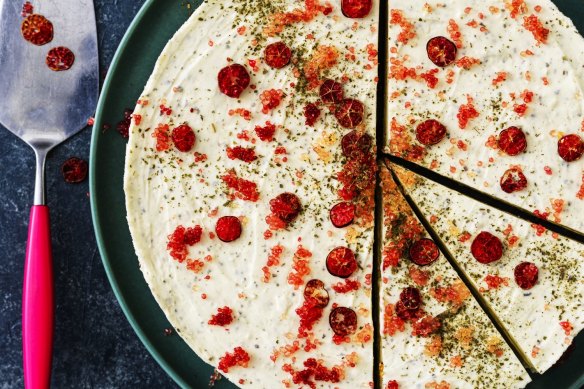 Cheesecake decorated with finger lime slices and "caviar".