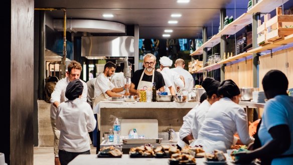 Massimo Bottura and his chefs at Refettorio Gastomotiva in Brazil.