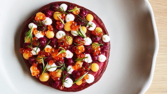 Beetroot pancake with trout roe and lemon curd.