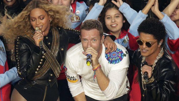 A high-powered delegation from NSW saw Beyonce, Coldplay singer Chris Martin and Bruno Mars perform at the Super Bowl before jetting off to Las Vegas and London.