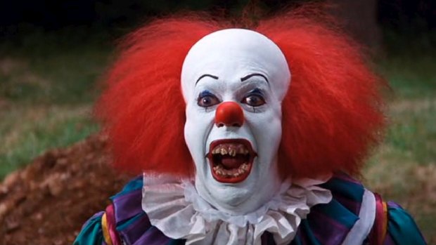 Tim Curry as Pennywise in the cult 1990 mini-series.