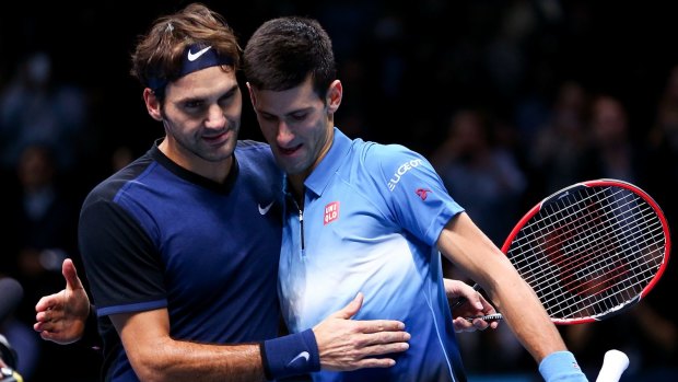 The best of enemies: Roger Federer and Novak Djokovic will meet in a semi-final at Melbourne Park on Thursday night. 