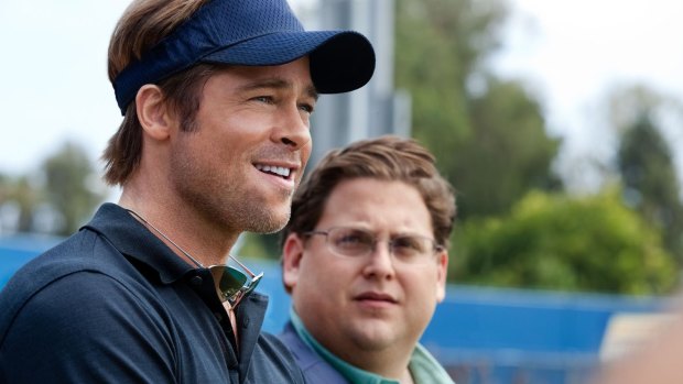 Brad Pitt as Billy Beane and Jonah Hill as Peter Brand in 2011 movie <i>Moneyball</i>. Brand is the fictionalised version of the assistant who pioneered the data-driven approach to player selection for the Oakland A's. 