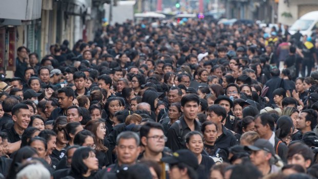 Thai mourners line up ahead of the Royal Cremation ceremony in Bangkok on Wednesday.
