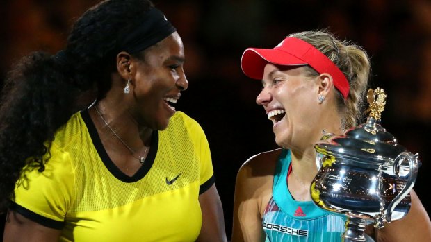 Winners are grinners at the Australian Open as 2016 runner-up Serena Williams shares a moment with winner Angelique Kerber.