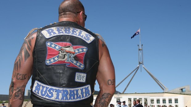 A patched Rebels member who was among riders protesting bikie laws at Parliament House in Canberra in December 2014. 