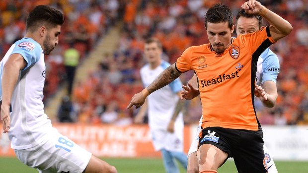 Stepping up: Jamie Maclaren takes on Melbourne City at Suncorp Stadium.